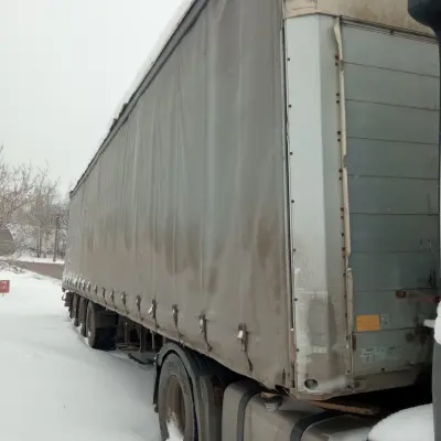 Грузовой тягач Mercedes-Benz Axor 1840L с полуприцепом SCHMITZ S01